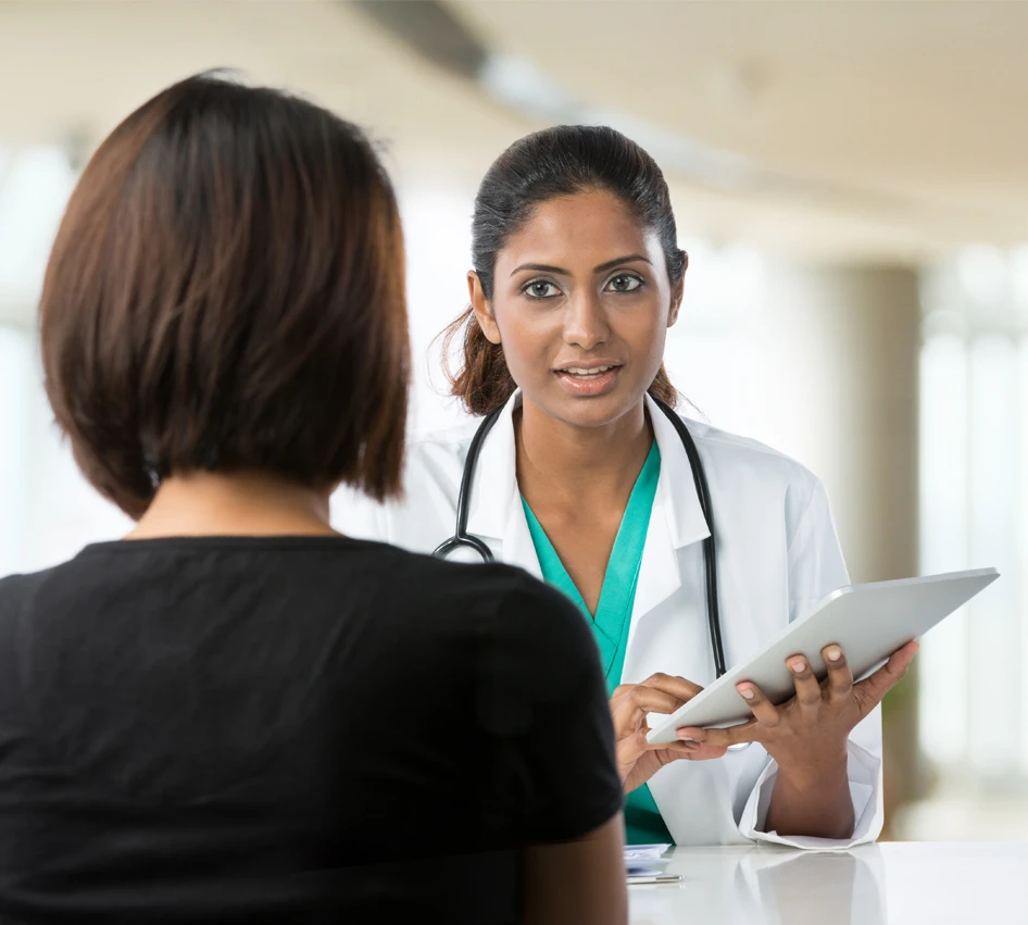 female doctor explaining things to patient